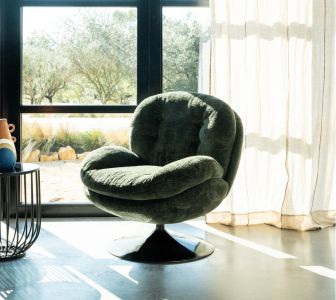 Sublimez votre salon avec le fauteuil vert